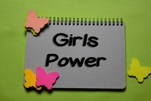 Girls Power write on a book isolated on office desk. photo