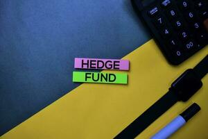 Hedge Fund text on top view color table background. photo