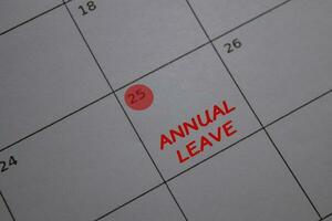 Annual Leave write on calendar. Date 25. Reminder or Schedule Concepts photo