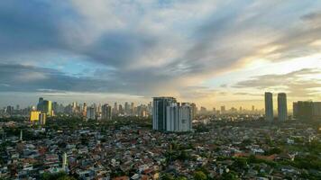 Aerial view of Jakarta Central Business District shot from a drone at sunrise. Jakarta, Indonesia, March 2, 2022 photo