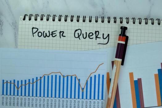 Concept of Power Query write on a book with statistics isolated on Wooden Table. photo