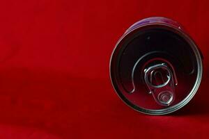 close up milk cans rolling in red background photo