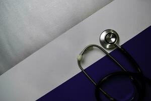 Stethoscope isolated on color background. Healthcare Medical concept photo