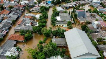 Aerial POV view Depiction of flooding. devastation wrought after massive natural disasters at Bekasi - Indonesia photo