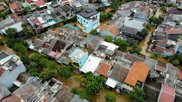 Aerial POV view Depiction of flooding. devastation wrought after massive natural disasters at Bekasi - Indonesia photo