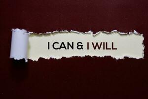 I Can and I Will Text written in torn paper photo