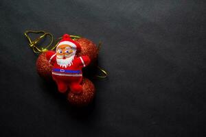 Decorative Christmas and santa claus isolated on black background photo