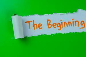 The Beginning Text written in torn paper photo