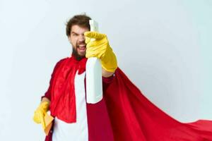 cleaner wearing a red coat detergent service housework cropped view Professional photo