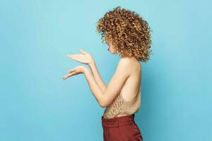 Woman portrait Curly hair side view gestures hands emotions Studio Copy Space charm photo