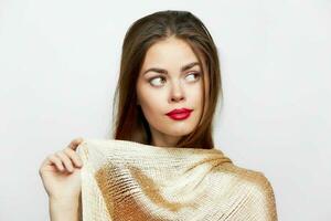 Woman with a scarf looking aside lifestyle red lips photo