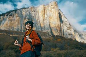 woman hiker backpack vacation landscape mountains travel photo