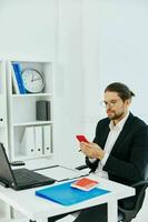 manager documents work office laptop executive photo