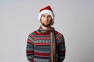 man in Christmas clothes holiday New Year Studio photo