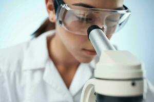 female doctor laboratory microscope science chemistry photo