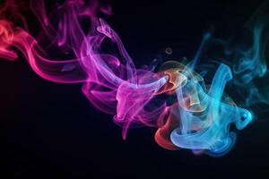 Abstract colored smoke on black background. . photo