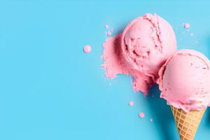 Strawberry ice cream in a waffle cone on a blue background, creative, copy space. photo