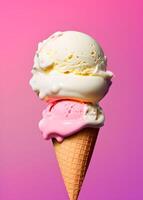 Vanilla ice cream in a cone on a pink background. photo