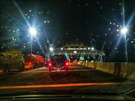 Demak, Indonesia in April 2021. Sayung Toll Gate in Demak which is one of the ramp off and ramp on Semarang Demak Toll Road photo