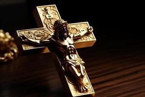 Golden cross of Jesus Christ crucified. Religion and Christianity concept. photo