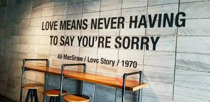 Jakarta, Indonesia in March 2019. One corner of a coffee shop that has quotes Love means never having to say you're sorry photo