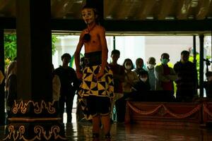 Yogyakarta, Indonesia on October 2022. Puppet people at the Yogyakarta Palace, the performance shown is about the play of the characters Petruk, Semar, and Gareng. photo