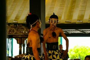 Yogyakarta, Indonesia on October 2022. Puppet people at the Yogyakarta Palace, the performance shown is about the play of the characters Petruk, Semar, and Gareng. photo