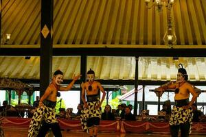 Yogyakarta, Indonesia on October 2022. Puppet people at the Yogyakarta Palace, the performance shown is about the play of the characters Petruk, Semar, and Gareng. photo