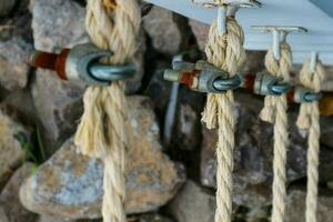 rope for boats is a collection of linear plies, threads or strands that are twisted or braided together photo