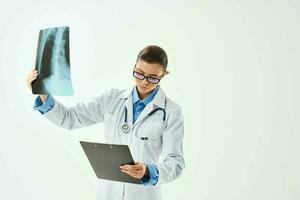 female doctor in white coat x-ray professional research photo