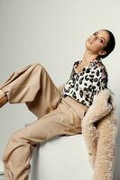 pretty woman bright makeup leopard shirt studio fashion photo