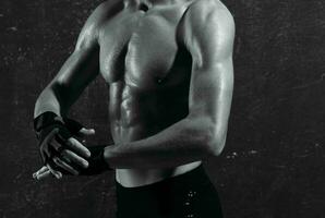 sports man inflated torso posing black and white photo fitness