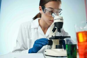 female doctor laboratory microscope science chemistry photo