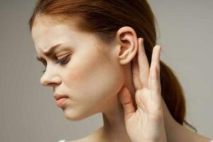 woman ear pain otitis media health problems infection light background photo