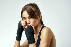woman sporting boxing bandages rack kickboxing exercise photo