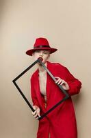 pretty woman with wooden frame posing red suit studio model unaltered photo