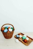 Easter holiday church traditions eggs on a chalkboard and in a basket photo