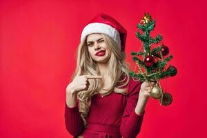 attractive blonde Christmas tree holiday gifts photo