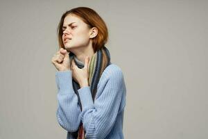 red-haired woman neck scarf cold handkerchief close-up photo