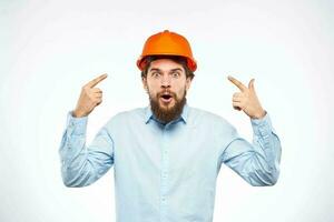 emotional men orange helmet engineer construction industry lifestyle cropped view photo