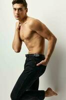 male topless black jeans posing fashion self confidence photo