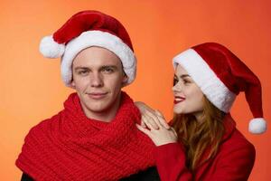 merry couple friendship christmas decoration fun red background photo