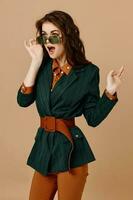 attractive woman wearing sunglasses suit luxury model lifestyle photo