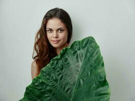 pretty charming woman palm green leaf exotic photo