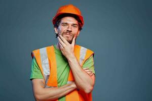 Cropped view of bearded man in working uniform construction engineer photo