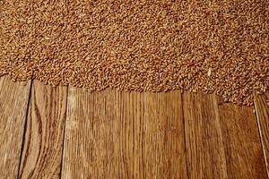 sprinkled cereals on a wooden table top view kitchen healthy food photo