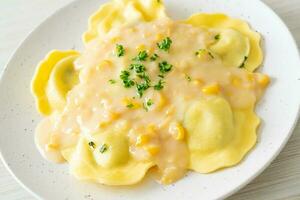 ravioli pasta with corn cheese sauce photo