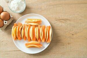 flat pancake roll with crab stick photo