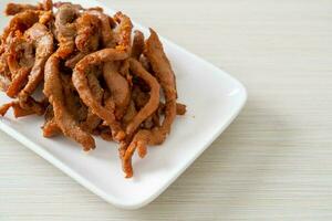 Sun-Dried Pork on white plate photo