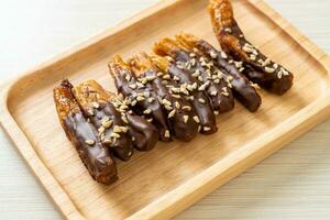 banana chocolate coating or banana dipped chocolate photo